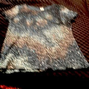 This top is stretchy and comfortable with sequins all over